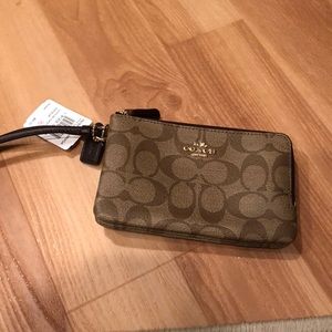 New with tags, brown coach wristlet!